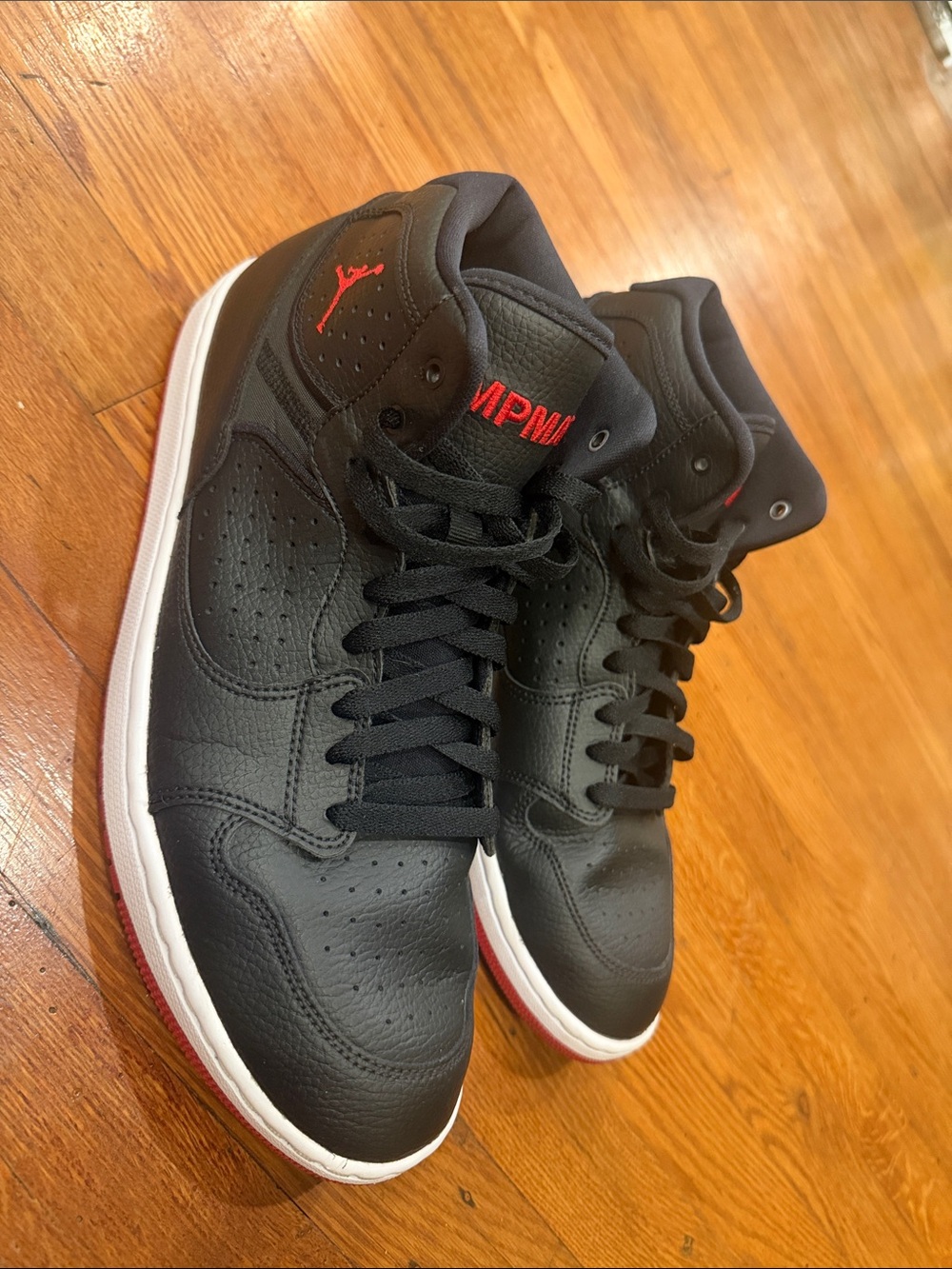 size 11 jordan Men’s Black and Red Mid-Top use good condition Sneakers no box
